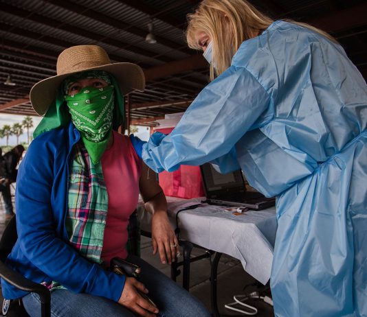 Taking the vaccine into the fields to help vulnerable farmworkers