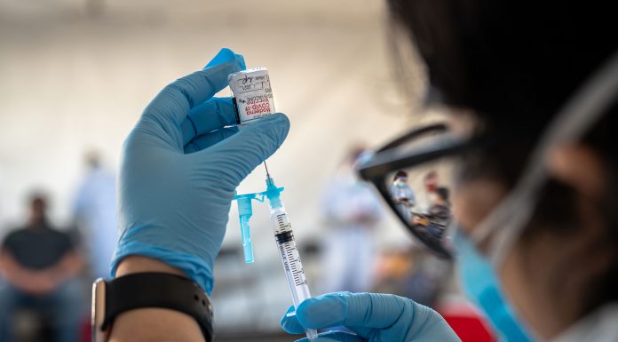 Fully vaccinated people can have small gatherings indoors, CDC says