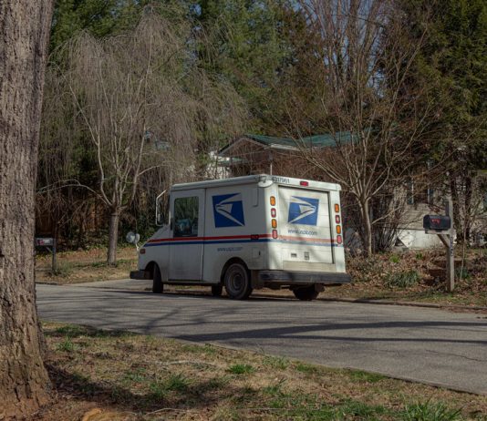Postal Service plans price increases and service cuts to shore up finances