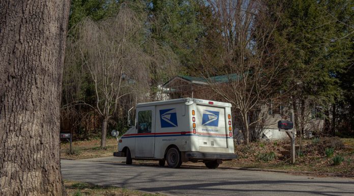 Postal Service plans price increases and service cuts to shore up finances