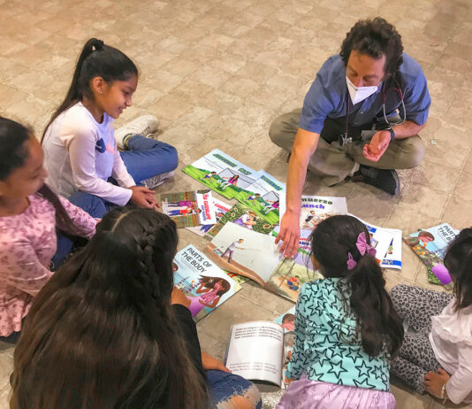 Mee Memorial doctor introduces healthful books to youth