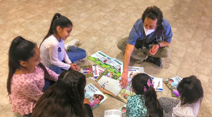 Mee Memorial doctor introduces healthful books to youth