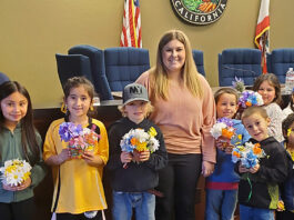 Gonzales and Soledad youth work on flower displays for upcoming fair