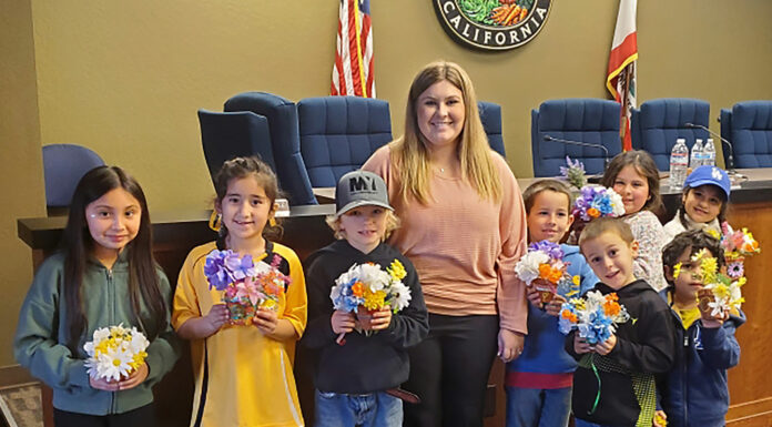 Gonzales and Soledad youth work on flower displays for upcoming fair