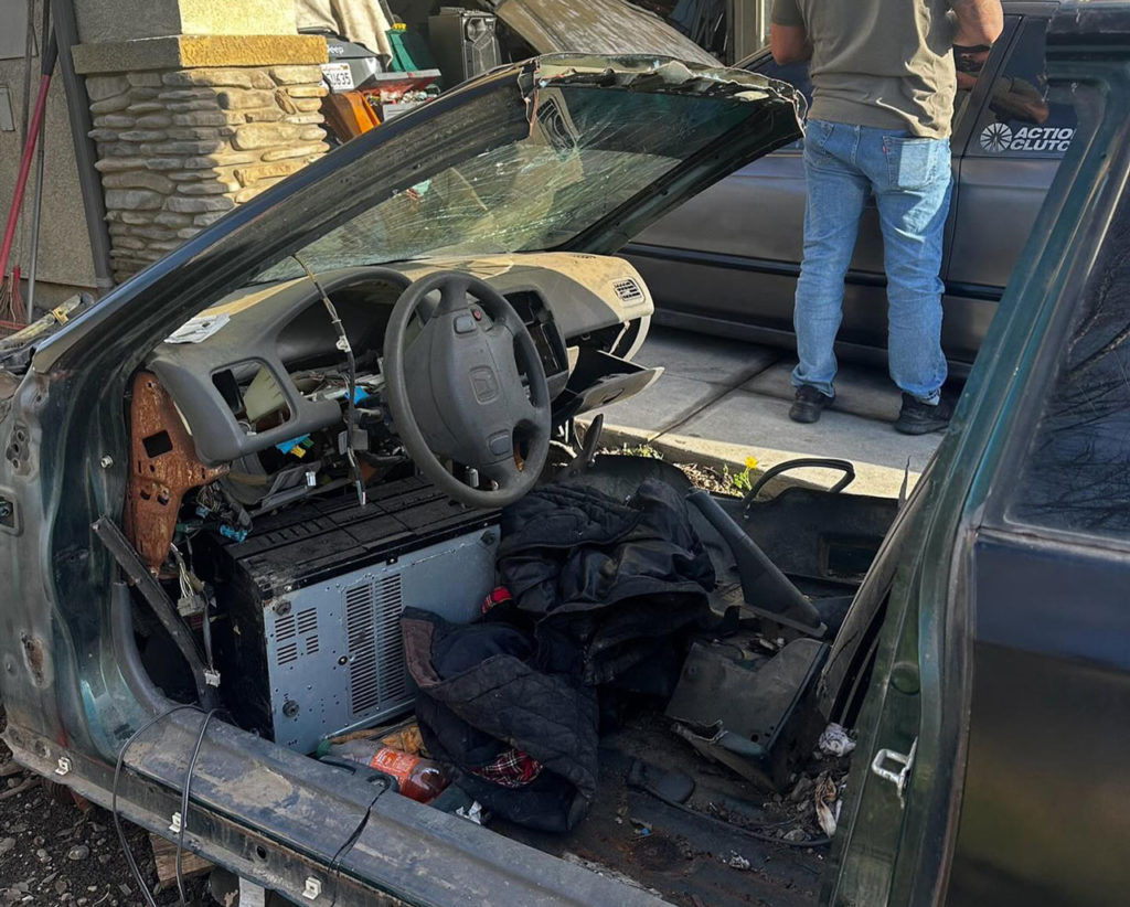 Image for display with article titled Greenfield Police discover ‘chop shop,’ arrest man for vehicle theft