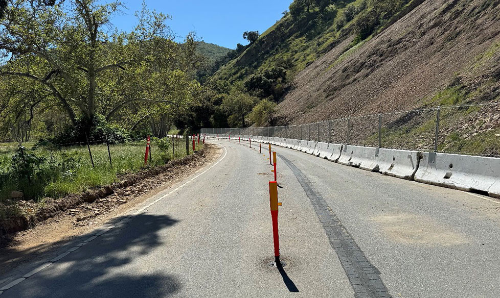 Image for display with article titled Arroyo Seco Road Reopens Following Slide Safeguard Work
