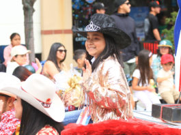 Greenfield cancer survivor leads Kiddie Kapers Parade as grand marshal