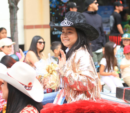 Greenfield cancer survivor leads Kiddie Kapers Parade as grand marshal