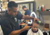 Businesses partner to provide haircuts, backpacks and treats to Soledad students