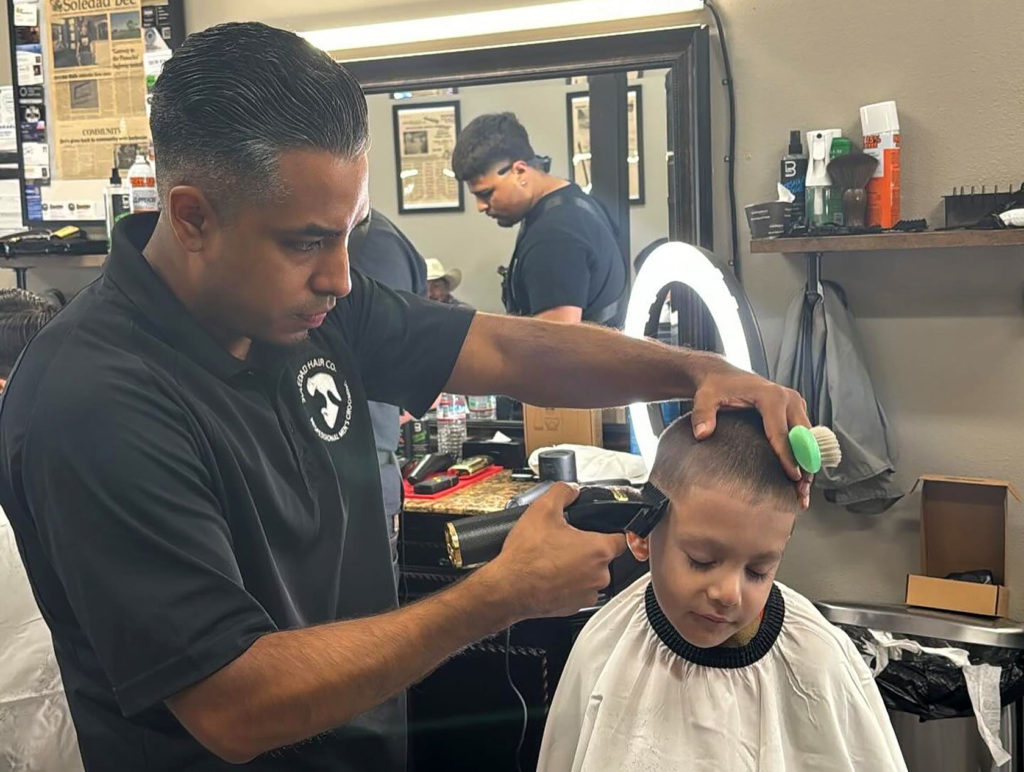 Image for display with article titled Businesses Partner to Provide Haircuts, Backpacks and Treats to Soledad Students