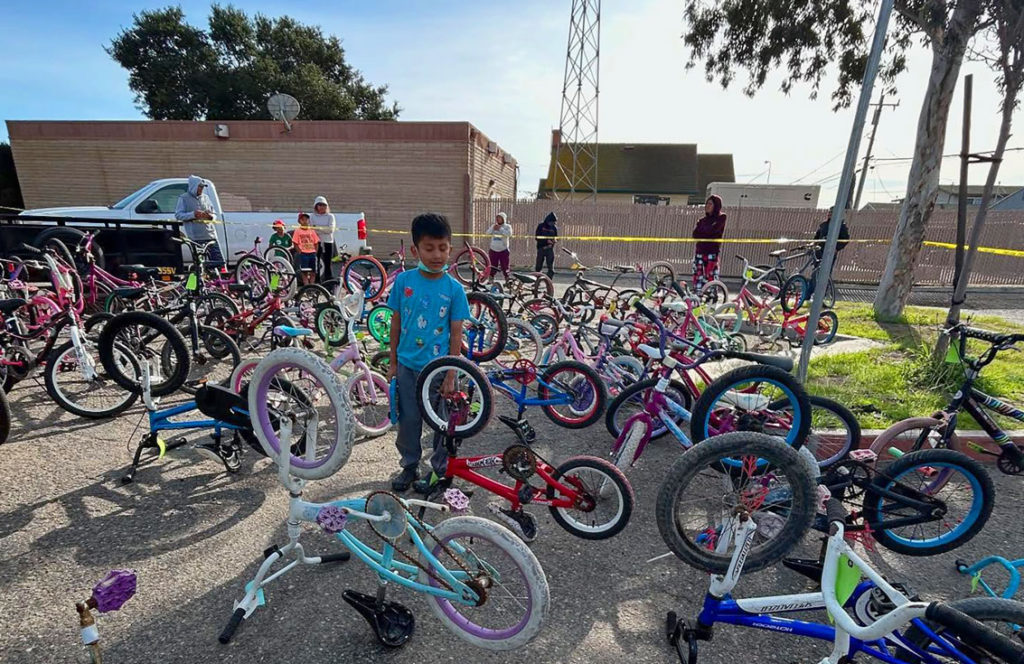 Image for display with article titled Greenfield Youth Receive Free Bikes for Dia De Los Reyes