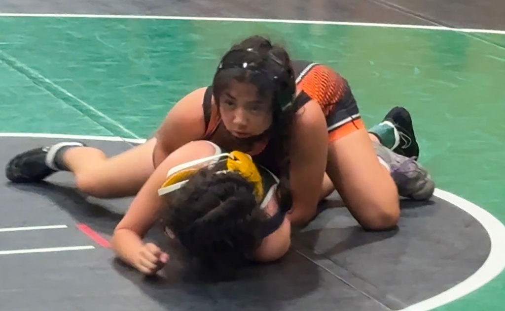 Image for display with article titled Wrestling | Gonzales Spartan Girls Place at Tournament