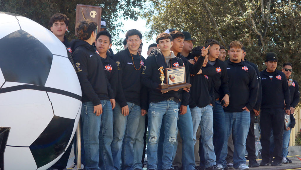 Image for display with article titled Gonzales Celebrates High School Soccer Champions With Festive Parade