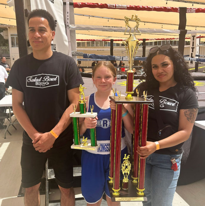 Gonzales-boxer-Izzy-Pacheco-(middle)-is-flanked-by-her-coaches