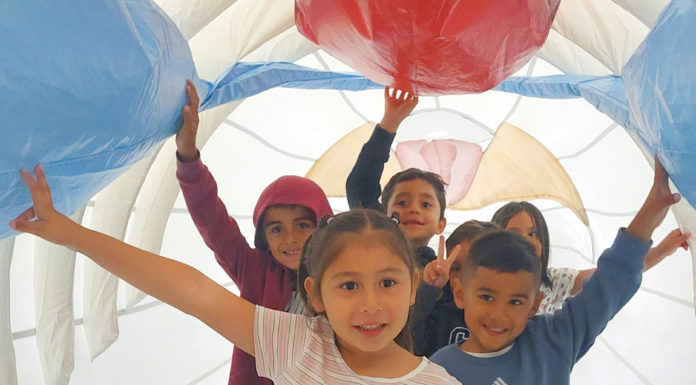 Gonzales youth explore humpback whale replica at Fairview Middle School Gonzales Kid Power After-School Program whale
