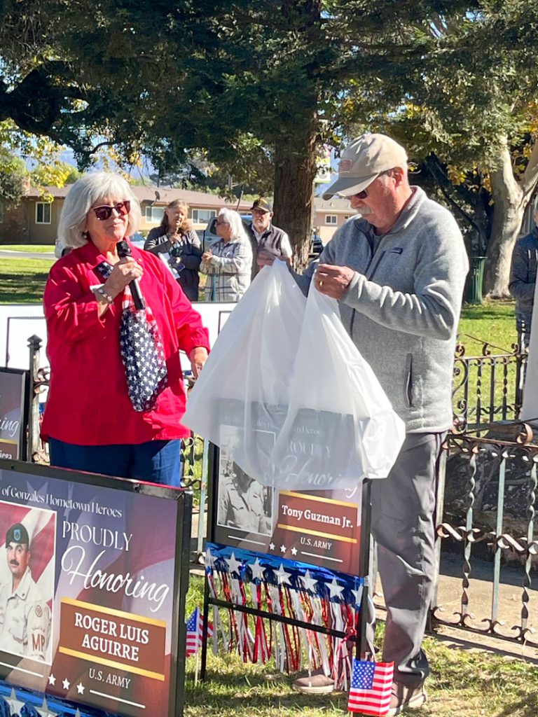 Gonzales Veterans Day Ceremony Hometown Heroes signs