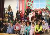 Nearly century-old candy tradition lives on in Gonzales Gonzales students with Santa