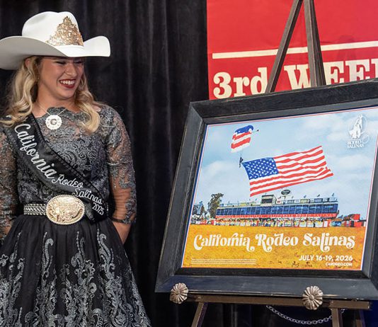 California Rodeo Salinas unveils 2026 commemorative poster Woman stands next to rodeo poster