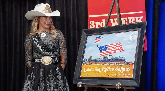 California Rodeo Salinas unveils 2026 commemorative poster Woman stands next to rodeo poster