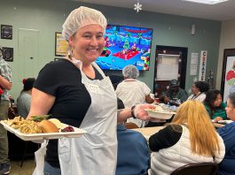 Interimās Winter Holiday Meal brings warmth to residents in need Winter Holiday Meal