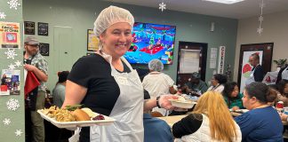 Interimās Winter Holiday Meal brings warmth to residents in need Winter Holiday Meal