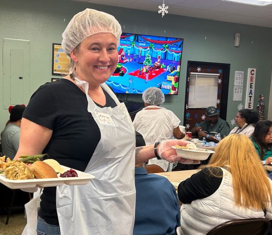 Interimās Winter Holiday Meal brings warmth to residents in need Winter Holiday Meal