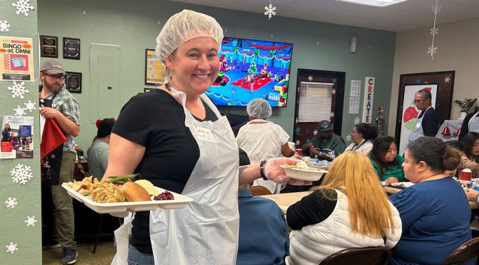 Interimās Winter Holiday Meal brings warmth to residents in need Winter Holiday Meal