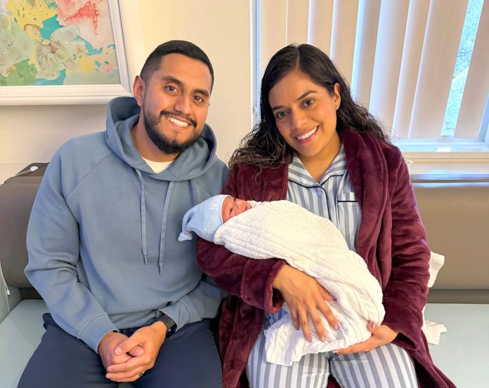 Soledad parents with baby