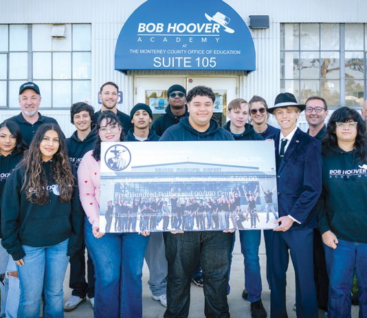 Bob Hoover Academy students raise $500 for Rape Crisis Center of Monterey County Bob Hoover Academy students with check