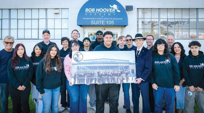 Bob Hoover Academy students raise $500 for Rape Crisis Center of Monterey County Bob Hoover Academy students with check