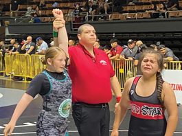 Gonzales middle-school wrestler wins state title Gonzales wrestler hand raised after winning