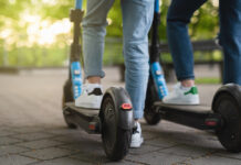 Greenfield police begin zero-tolerance enforcement on e-bikes, e-scooters Mother and daughter riding electric scooters