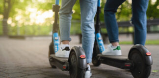 Greenfield police begin zero-tolerance enforcement on e-bikes, e-scooters Mother and daughter riding electric scooters