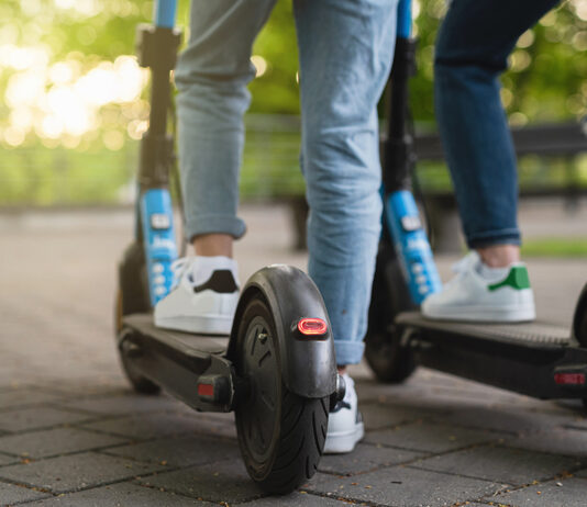 Greenfield police begin zero-tolerance enforcement on e-bikes, e-scooters Mother and daughter riding electric scooters