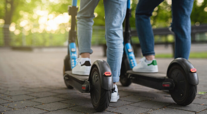 Greenfield police begin zero-tolerance enforcement on e-bikes, e-scooters Mother and daughter riding electric scooters