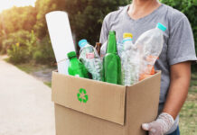 Gonzales hosts free recycling event Saturday woman hand holding box garbage for recycle