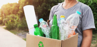 Gonzales hosts free recycling event Saturday woman hand holding box garbage for recycle
