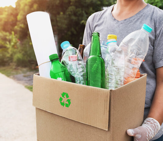Gonzales hosts free recycling event Saturday woman hand holding box garbage for recycle