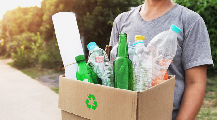 Gonzales hosts free recycling event Saturday woman hand holding box garbage for recycle