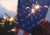 Cal Fire, local partners unite to promote fireworks safety Hand holding sparkler fireworks