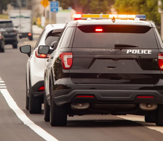 Speeding crackdown set for this summer in South Monterey County Behind view of a police car that pulled a motorist over to the side of the road