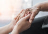 Alzheimer’s Association expands outreach in South Monterey County this fall Parkinson disease patient, Alzheimer elderly senior, Arthritis person hand in support of nursing family caregiver care for disability awareness day