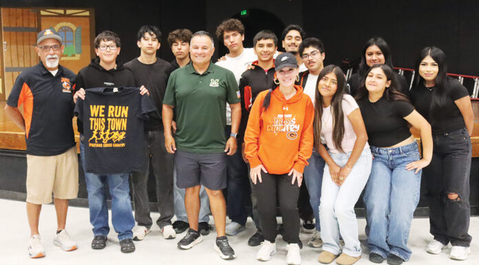 McFarland cross country runner inspires Gonzales High athletes Thomas Valles with Gonzales cross country team
