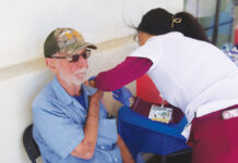 Gonzales flu clinic vaccinates 228 residents Man gets flu shot at Salinas Valley Health flu clinic