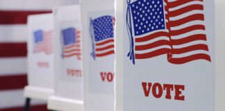 General Election 2026 | Salinas Valley voters consider sales and recreation taxes, school changes voting booths at polling station during American election