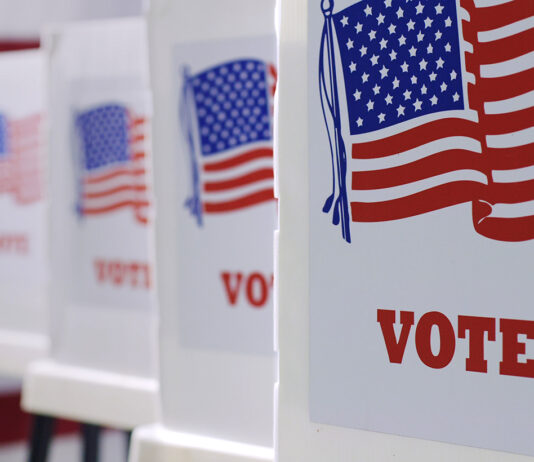 General Election 2026 | Salinas Valley voters consider sales and recreation taxes, school changes voting booths at polling station during American election